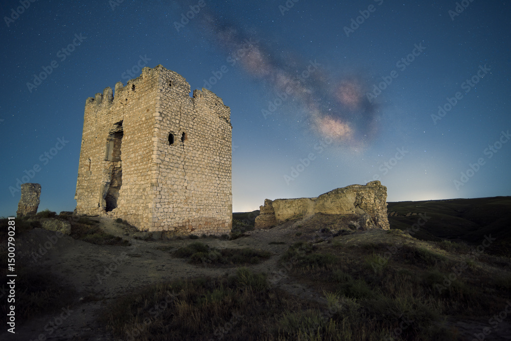 starry night sky with the milky way over an abandoned castle starry night sky with the milky way over an abandoned castle