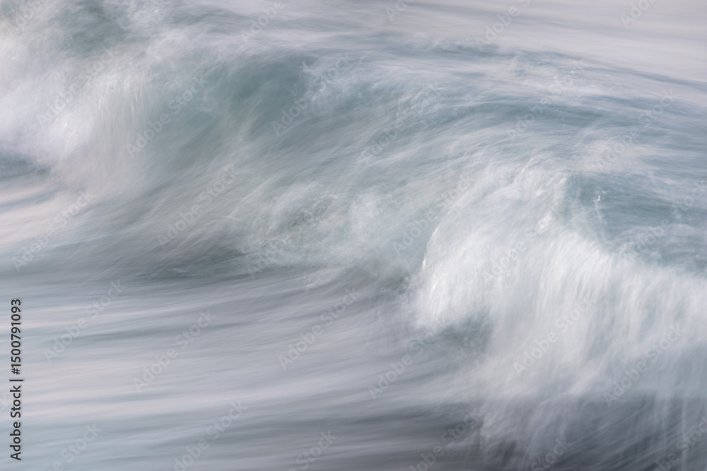 Fototapeta premium Soft ocean wave breaking on minimal ICM with blue turquoise and white