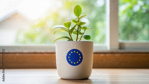 Green plant in white flower pot with European Union emblem on windowsill symbolizing EU environmental policy, sustainable development, green economy, eco-friendly practices, climate strategy, ecologic