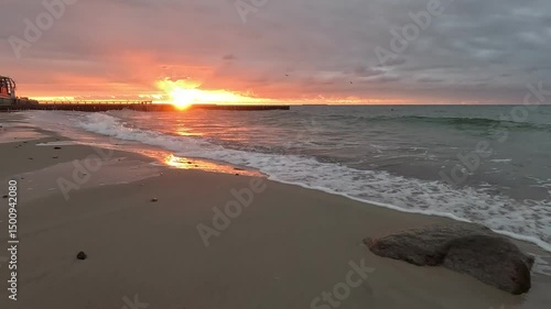 sandy beach on the embankment of Zelenogradsk