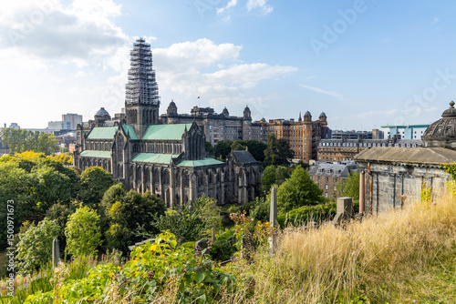 Glasgow cityscape in Scotland, where historic buildings meet modern architecture. The River Clyde flows through the heart of the city, crossed by iconic bridges and surrounded by vibrant urban life.