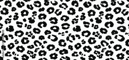Black and white leopard skin fur texture or leopard print pattern vector background