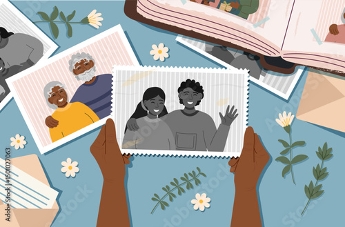 Human hands holding an old photo of young couple. Vintage and old photo of young people. Family and life values ​​concept. The concept of aging. 