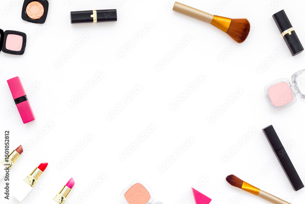 Makeup tools and cosmetics products, top view Makeup tools and cosmetics products, top view