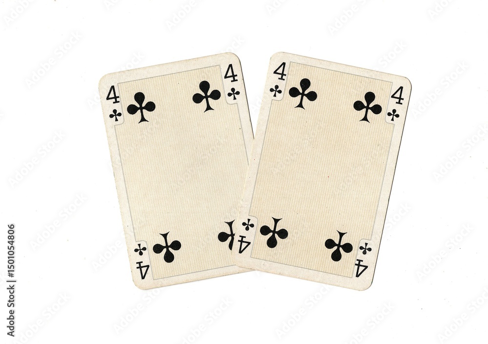 Obraz premium A pair of identical vintage playing cards isolated on a white background.