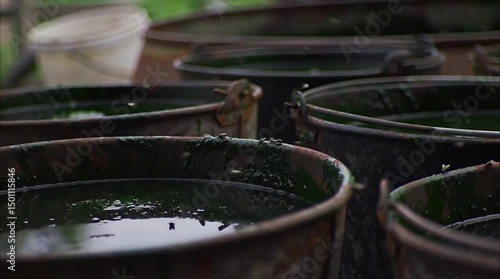 Contamination Hazards: Unsanitary Sludge & Stagnant Water Buckets