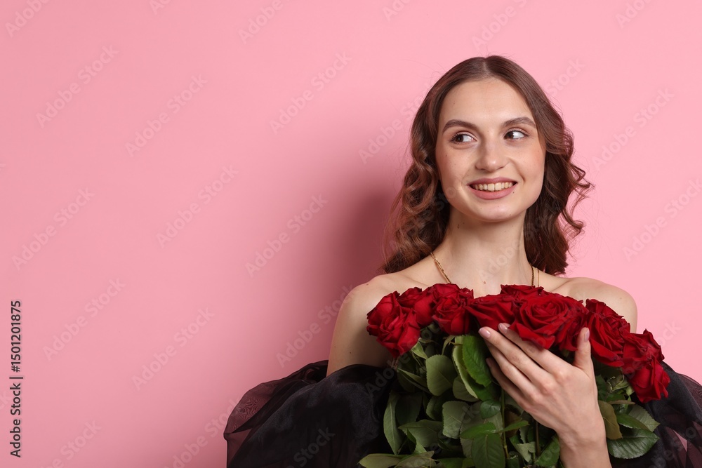 Smiling woman with bouquet of roses on pink background. Space for text Smiling woman with bouquet of roses on pink background. Space for text