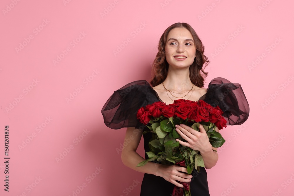 Smiling woman with bouquet of roses on pink background. Space for text Smiling woman with bouquet of roses on pink background. Space for text