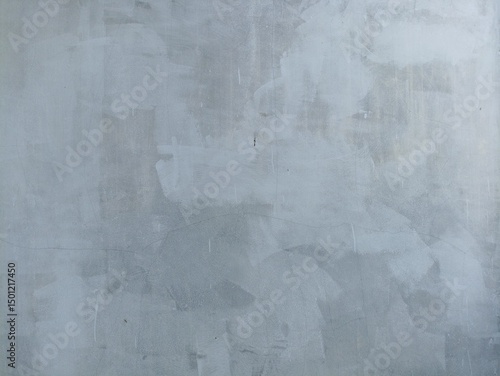 Gray Concrete Wall Texture with Brush Strokes and Subtle Cracks. Gray concrete wall with textured brush strokes and faint cracks. Great for use in abstract, grunge, or industrial design backgrounds