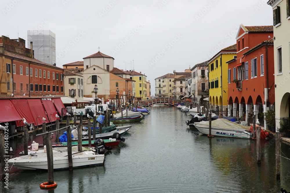 Obraz premium Old canals and streets in Chioggia, Italy