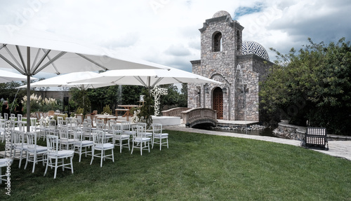 Beautiful Outdoor wedding ceremony in front of Arched Stone Passageway in a Historic Mexican Hacienda