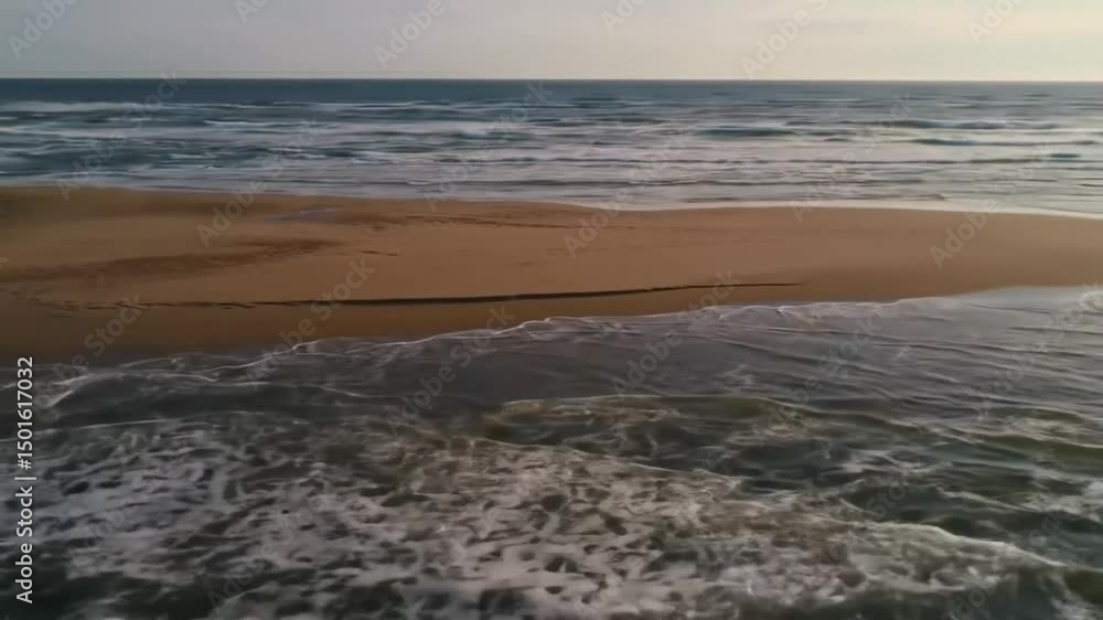 Coastal Serenity Gentle Waves Lap Golden Shoreline At Sunrise Coastal Serenity Gentle Waves Lap Golden Shoreline At Sunrise