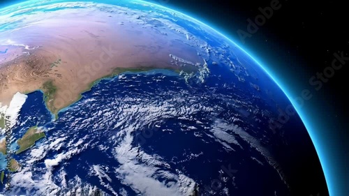 Digital rendering of planet Earth with cloud cover and visible continents, view from space, illuminated atmospheric glow effect