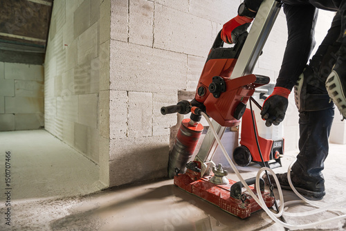 Core Drilling into Concrete Wall During Construction Work