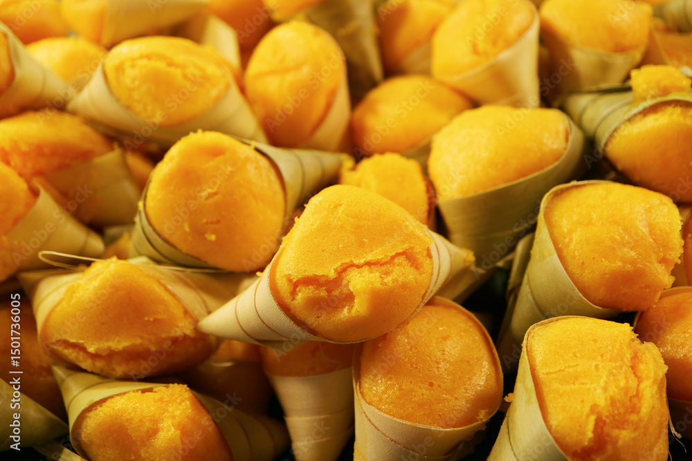 Pile of Aromatic Freshly Steamed Khanom Tan, Thai Traditional Dessert Flavored with Toddy Palm Pulp Pile of Aromatic Freshly Steamed Khanom Tan, Thai Traditional Dessert Flavored with Toddy Palm Pulp