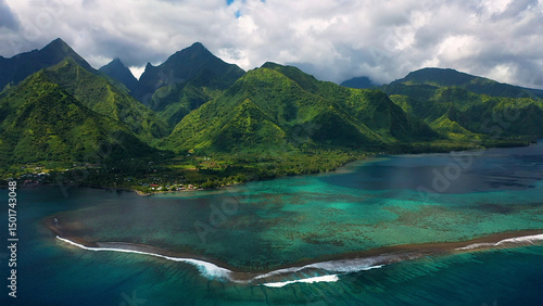 Aerial view of idyllic island with lush mountains, serene reef, and tranquil clouds, Tahiti, Windward Islands, French Polynesia.