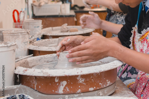students sculpting in ceramics class 