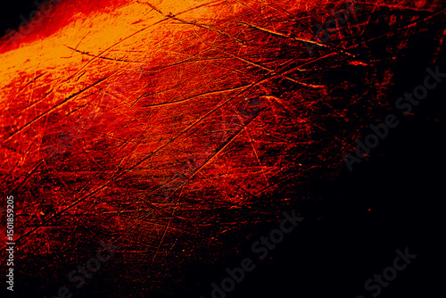 intense black red and orange gradient backgound with copy space. versatile scratched relief design element for dramatic abstract heat, fire and apocalyptic concepts.