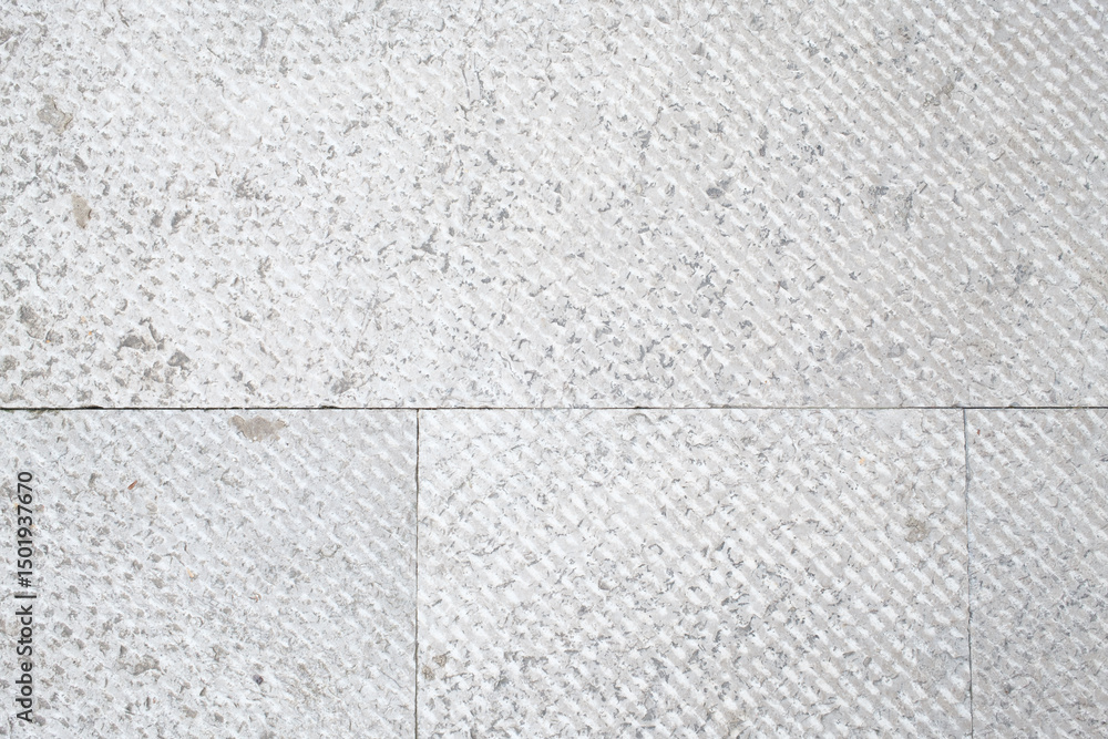 Fototapeta premium Textured stone tiles: subtle grey and white geometric pattern neutral tone