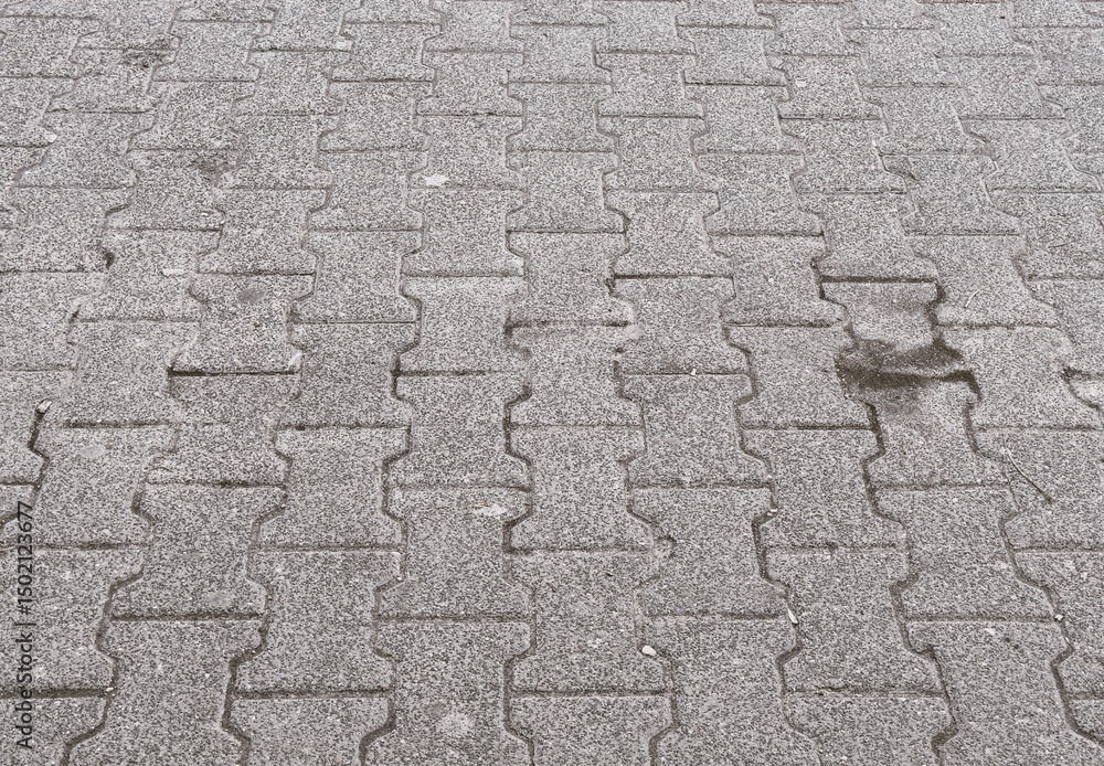 Detailed macro view of a dirty city sidewalk with visible dust, stains, and debris. Useful for themes of urban infrastructure, decay, public spaces, or environmental awareness. Detailed macro view of a dirty city sidewalk with visible dust, stains, and debris. Useful for themes of urban infrastructure, decay, public spaces, or environmental awareness.