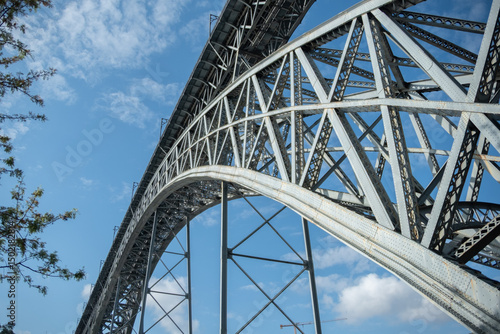 Dom Luis Bridge from below, in Porto, Portugal. Steel construction spanning the River Douro.