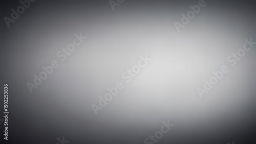 Softly Lit Gradient: A Subtle Transition from Dark Grey to Light Grey