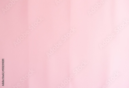 Smooth, light pink backdrop.