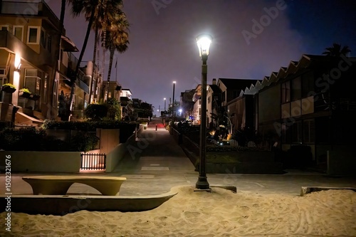 Fototapeta Naklejka Na Ścianę i Meble -  Looking up the roads and paths of small beach town neighborhoods, showing various styles of homes during late evening hours. 