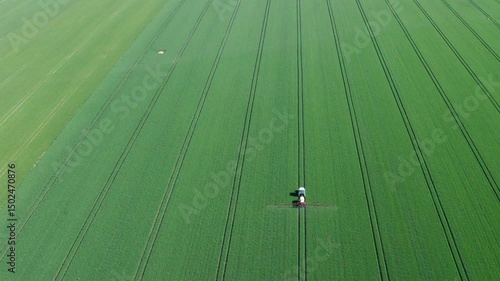 Aerial View of Farmer in Green Field