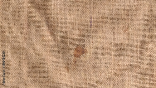 Close-up of fabric woven from burlap. Sackcloth textured background. 