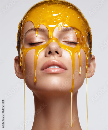 Woman With Honey Mask Dripping Down Face, isolated white background