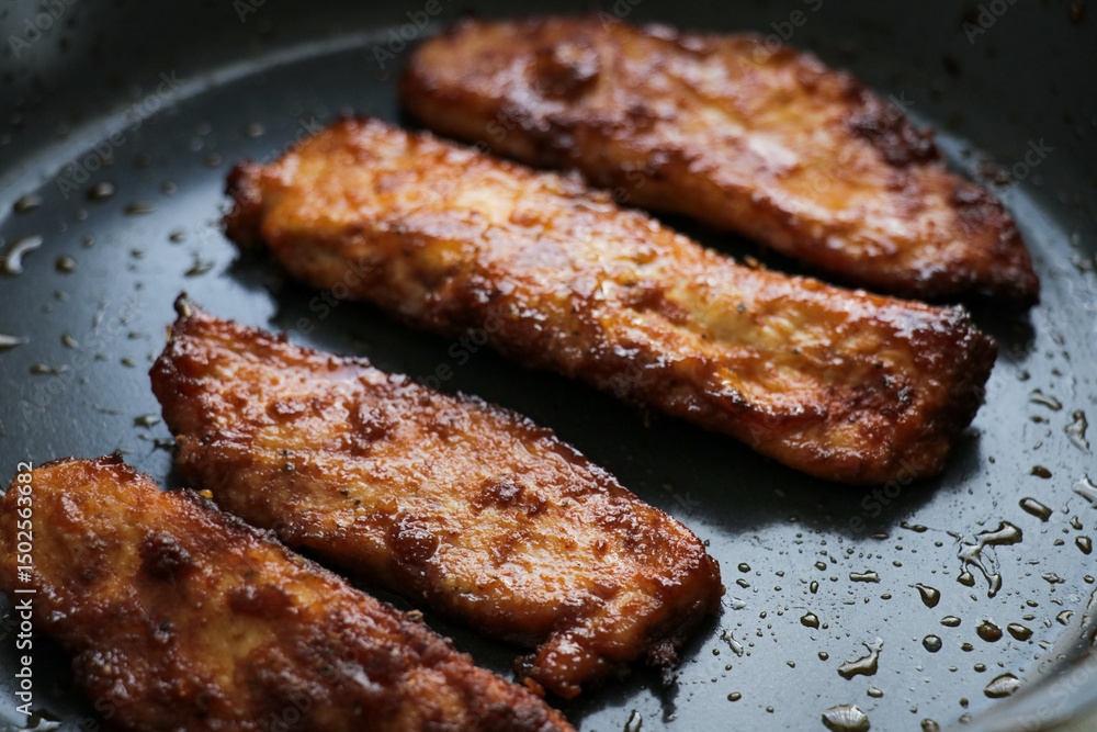 Chicken frying pan close up. Fresh juicy fried meat dinner prepared dish meal cooking grilling. Chicken frying pan close up. Fresh juicy fried meat dinner prepared dish meal cooking grilling.