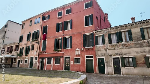 Venice, Italy - May 12, 2025 - Tourists visit the historic center of the lagoon city