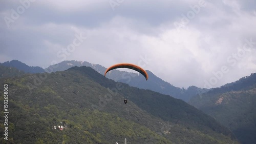 Paragliding at Bir Billing Himachal Pradesh India 2. 30 pm 10 January 2025 filmed from underneath. 4k high resolution footage.