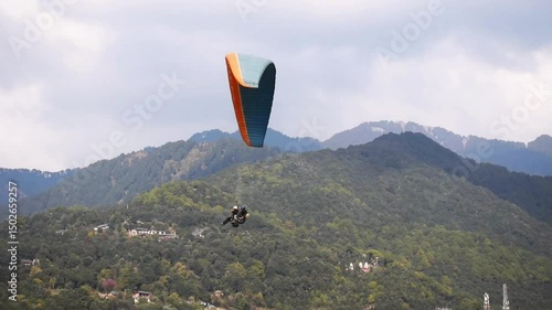 Paragliding at Bir Billing Himachal Pradesh India 2. 30 pm 10 January 2025 filmed from underneath. 4k high resolution footage.