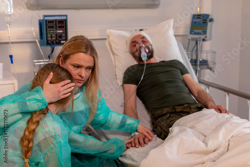 An emotional hospital scene highlights the crucial support and care from family in tough times