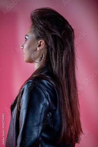 A Chic Profile Featuring a Stylish Leather Jacket Paired with a Bold and EyeCatching Hairstyle