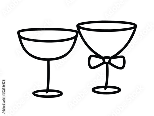 Two elegant crystal champagne glasses reflect the blue and white party celebration