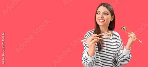 Young woman with chopsticks...