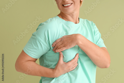 Mature woman checking her b...