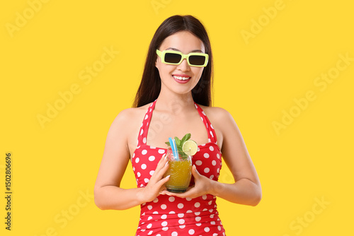 Happy young Asian woman in ...