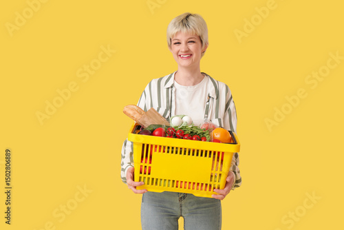 Young woman with full shopp...