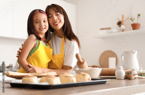 Happy asian mother and daug...