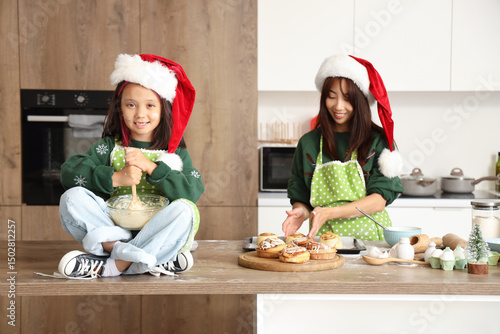 little Asian girl with her ...