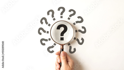 Wallpaper Mural Hand Holding Magnifying Glass Over Question Mark Torontodigital.ca