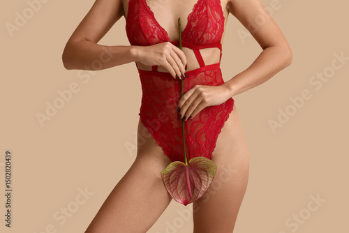 Young woman in sexy red und...