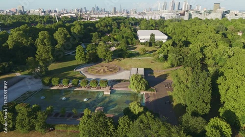 Aerial view of Battersea Park in sunset next to river Thames