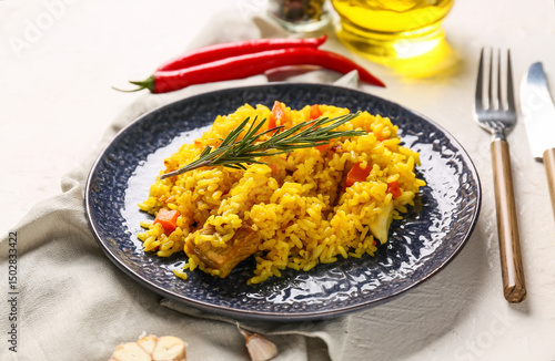 Plate of tasty pilaf with r...
