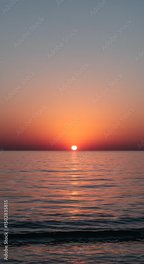 Fototapeta premium Serene Sunset over Calm Ocean Waters Vibrant Sky and Golden Hour Glow