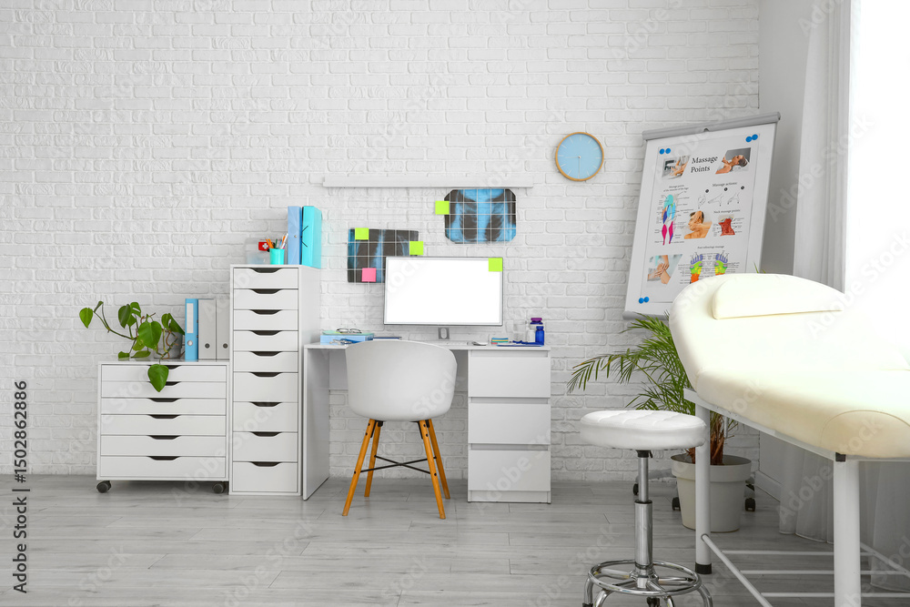 Fototapeta premium Interior of medical office with doctor's workplace and couch